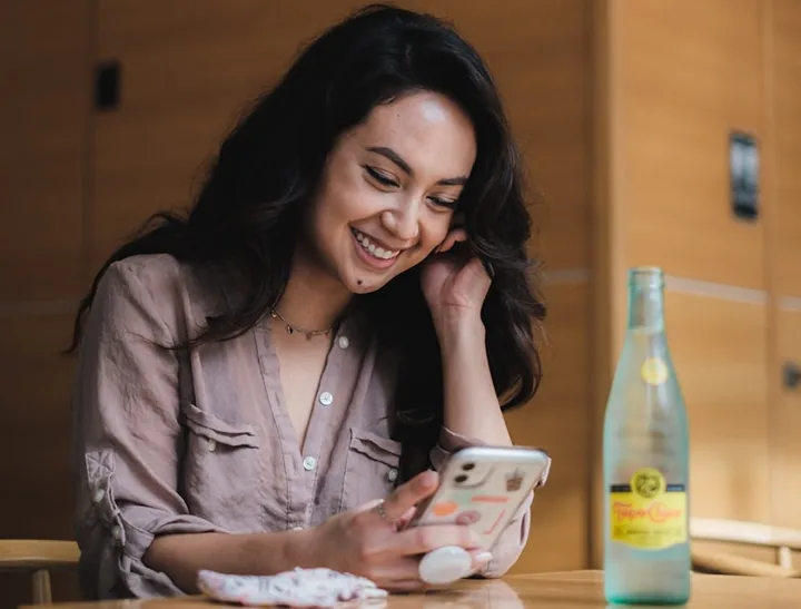 Happy customer on phone