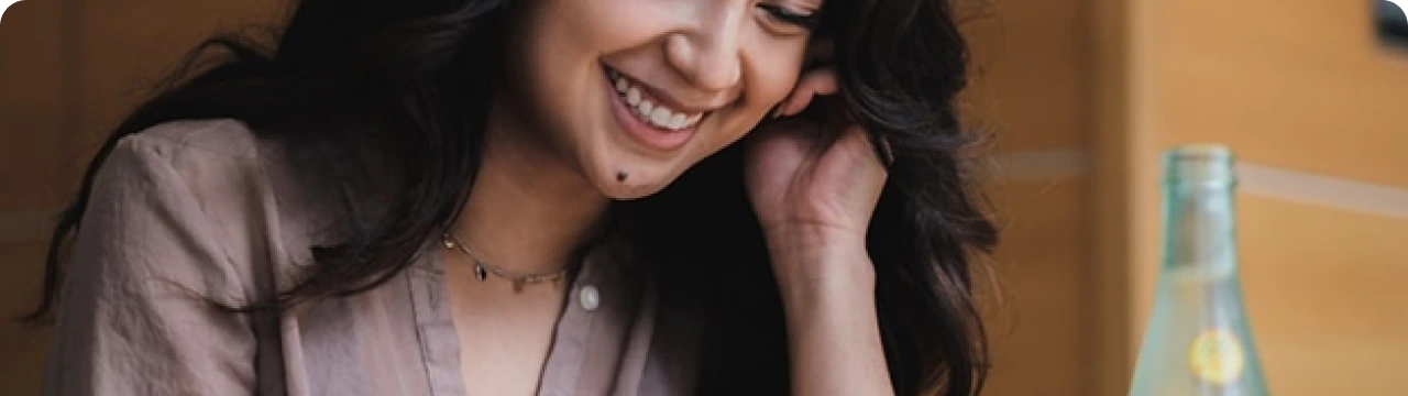 Smiling woman representing satisfied clients